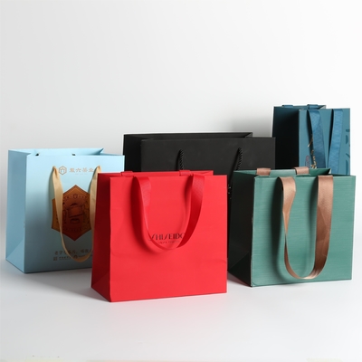 comprar Sacos de papel ecológicos com logotipo, bolsas de presente de papel de fita de seda luxuosa online manufacture